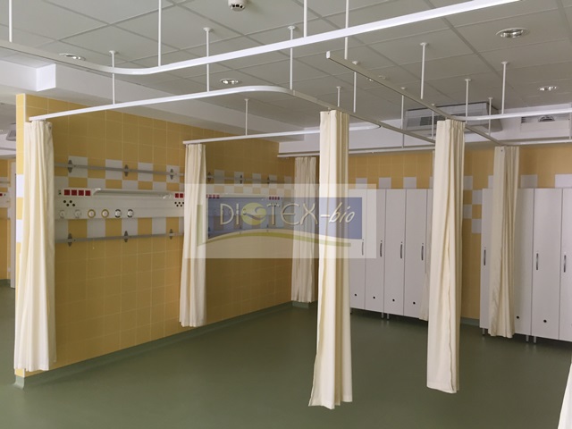 Antibakteriális, lángmentes elválasztĂł fĂĽggöny, ágyelválasztĂł karnisrendszer_ZMK_Diotex-Bio Kft függesztett kórházi karnisrendszer